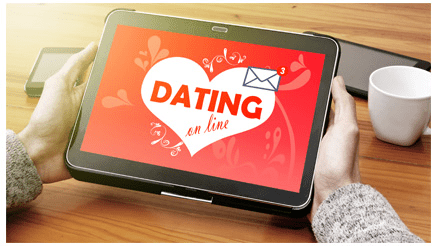 Person using a dating app on tablet